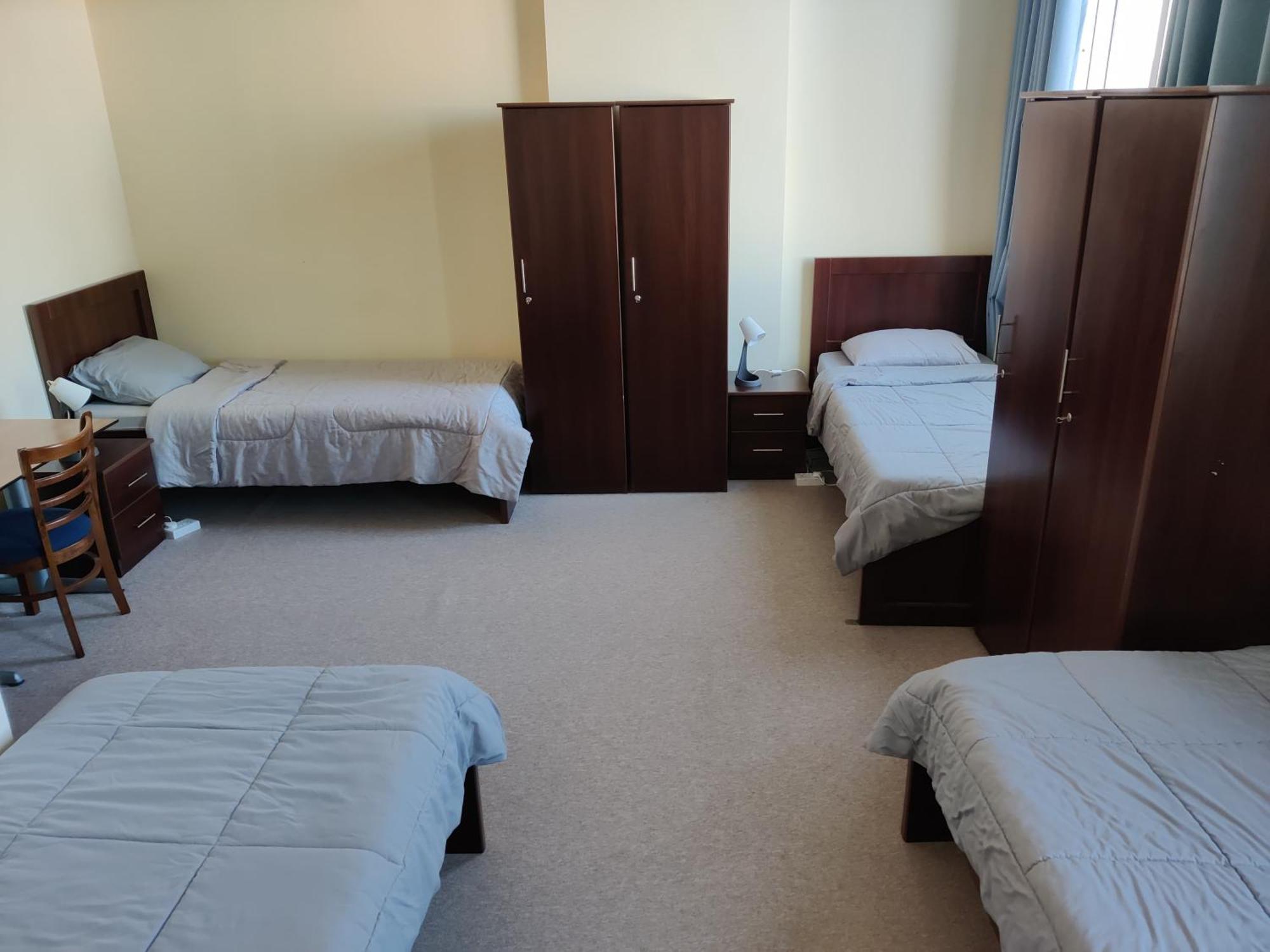 Oasis Hostel Абу-Даби Экстерьер фото